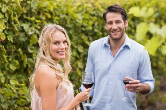 Young happy couple smiling at camera