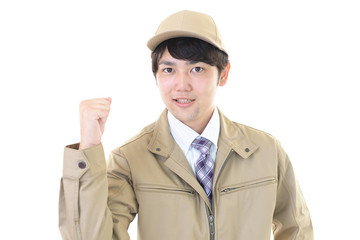 ガッツポーズの作業員