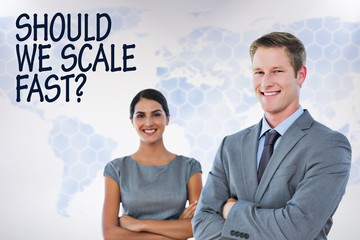 Composite image of smiling business colleagues smiling at camera