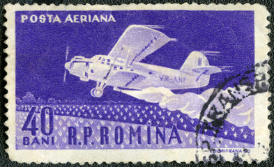 ROMANIA - CIRCA 1960: A stamp printed in Romania shows Amphibian ambulance plane, series 50th anniv. of the first Romanian airplane flight by Aurel Vlaicu