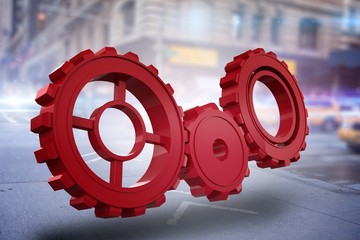 Composite image of red cog and wheel