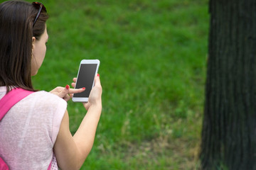 woman with a phone in his hand