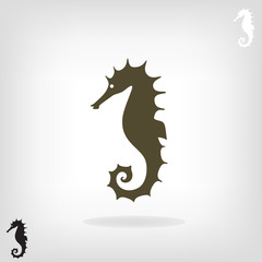 Stylized silhouette of a sea horse.