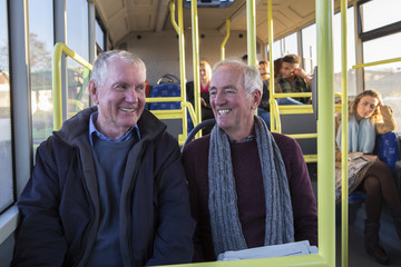 Senior men on the bus - obrazy, fototapety, plakaty