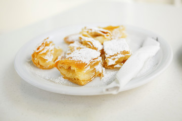 Sweet apple pie/Apple pie slices on plate. Traditional sweet food. Very shallow depth of field for soft background.