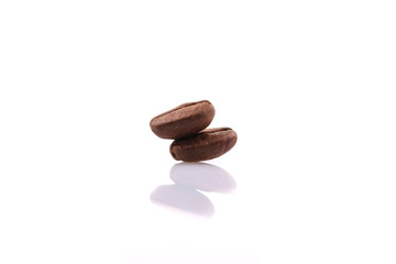 Fresh coffee beans on white Background