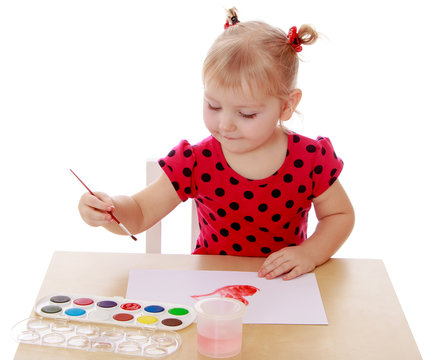 Girl draws paints