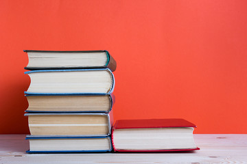Composition with vintage old hardback books, diary, fanned pages