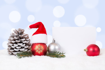 Fototapeta na wymiar Weihnachtskarte mit Mütze Weihnachten Dekoration mit Schnee und