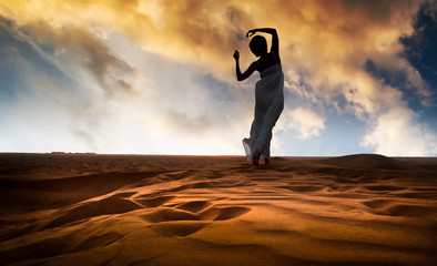 young woman in sandy desert