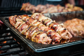 cooking meat on fire