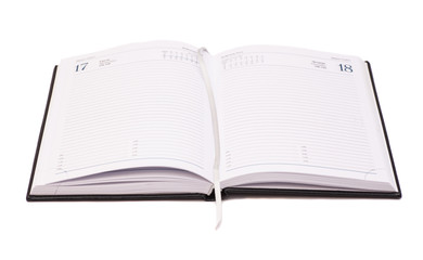 Open notebook isolated on white 