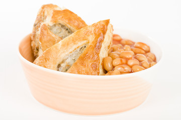 Sausage Roll & Beans - Bowl of sausage roll and baked beans.
