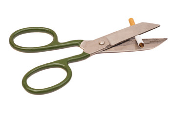 cigarettes with scissors isolated on white background