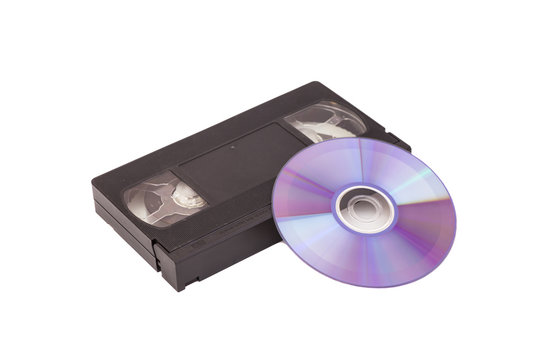 Old Video Cassettes tapes with DVD disc isolated on white background 