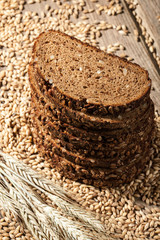 Rye bread with seeds on a wooden table