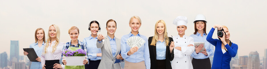 woman holding money over professional workers