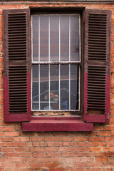 Window with Worn Out Wooden Shutters
