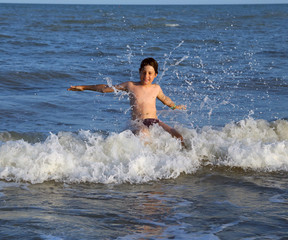 child hit the water with a mighty splash