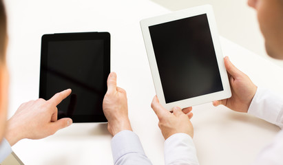 close up of businessman hands with tablet pc