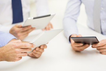 close up of businessman hands with tablet pc