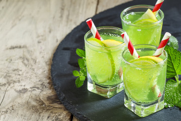 Mint soda with lemon and lime, selective focus