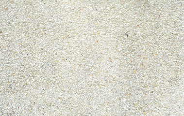 Dirty cement with small stone wall background