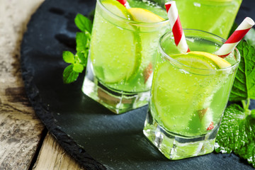 Mint soda with lemon and lime, selective focus