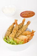 Breaded Prawns - King prawns coated in plain and spicy breadcrumbs and deep-fried.


