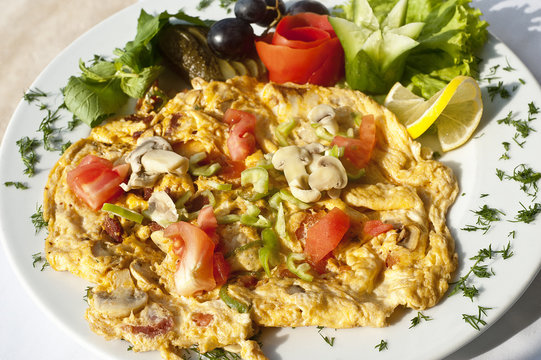 Omelet with sauteed mushrooms and vegetables