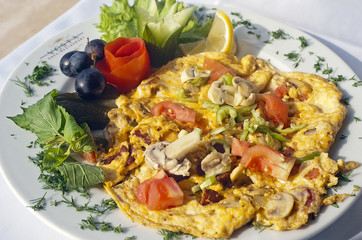 Omelet with sauteed mushrooms and vegetables