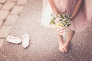 little girl with flowers. selective focus