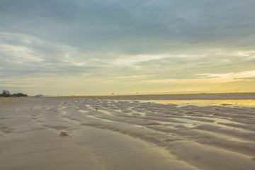 sand and beach with sunset
