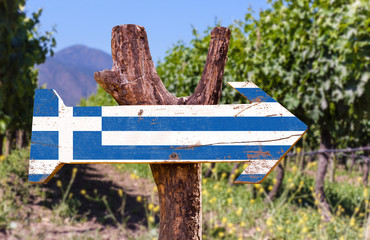 Greece Flag wooden sign with winery background