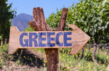 Greece wooden sign with winery background