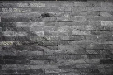 Abwaschbare Fototapete Steine Schwarze Steinmauer