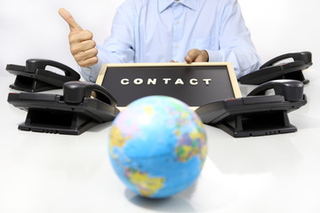 global international contact concept, hand like with office phon