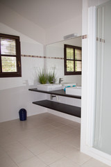 Well decorated modern white  washroom,