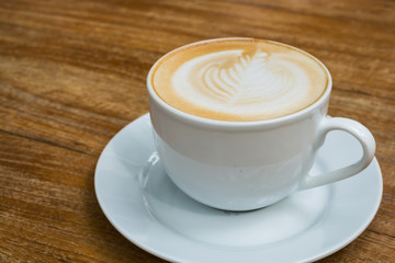 latte on wooden table brown color