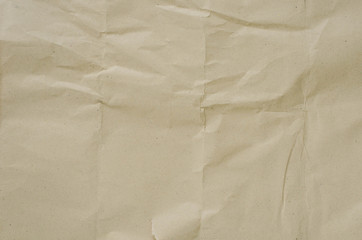 Brown paper pin on white background.