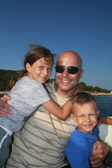Happy family on a boat , Croatia.