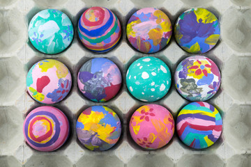 Fototapeta na wymiar Easter eggs on wooden background. Selective focus.