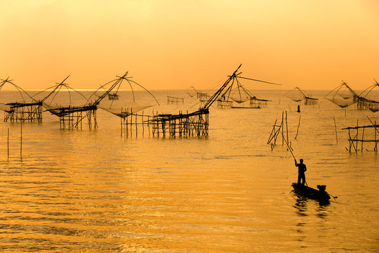 Fish farms at sunrise.