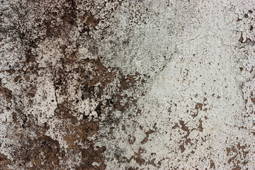 Textured walls with dirt.