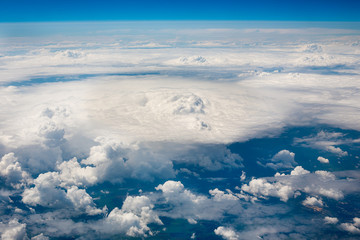 Fototapeta na wymiar Sky clouds and land background