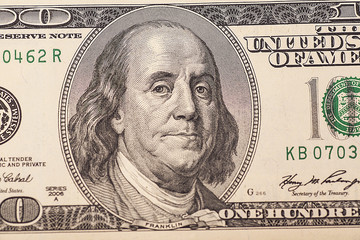 One hundred dollars pile as background 