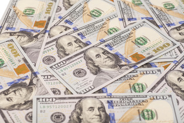 One hundred dollars pile as background 