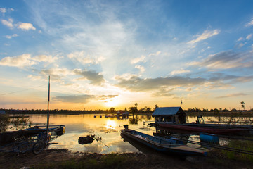 Small boat moored at the riverbank.