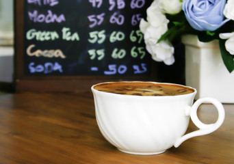 coffee cup on wood table