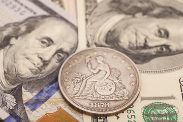 US dollar bills and coin